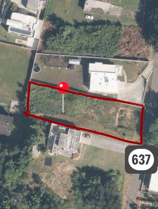 This aerial view shows a vacant, rectangular residential lot outlined in red — CARR 637 BO MIRAFLORES SECTOR BIAFARA, ARECIBO, PR