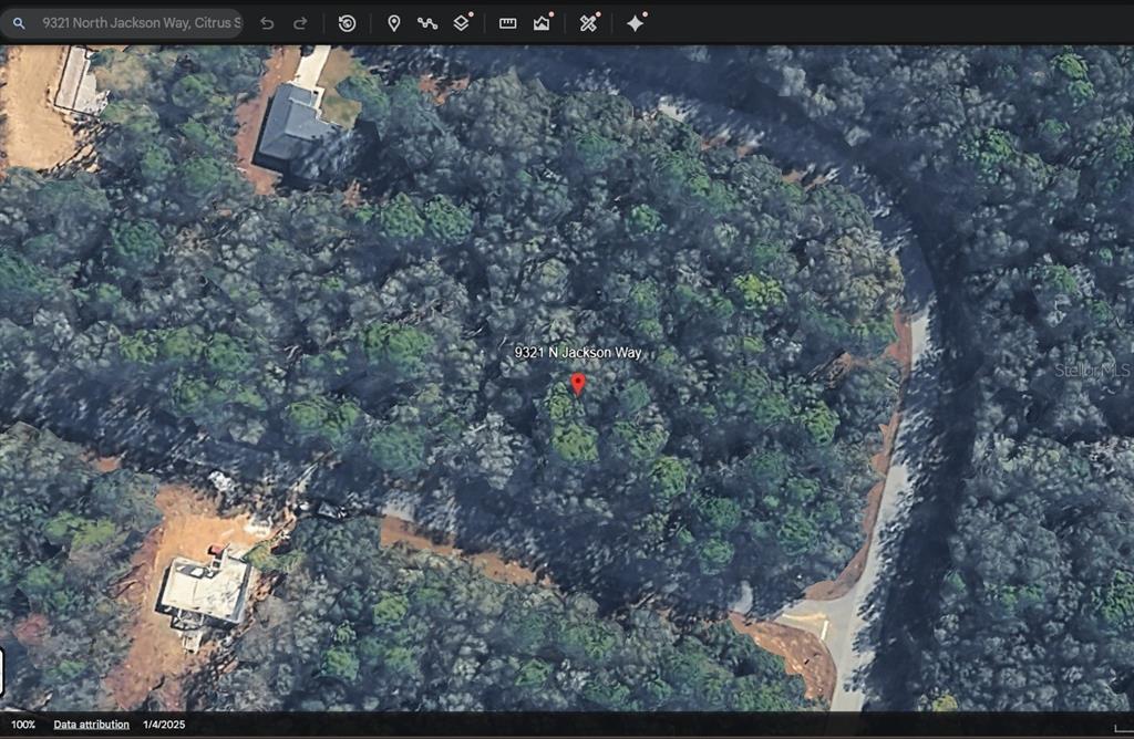This aerial map view shows a wooded residential lot with a red location pin — 9321 N JACKSON WAY, CITRUS SPRINGS, FL