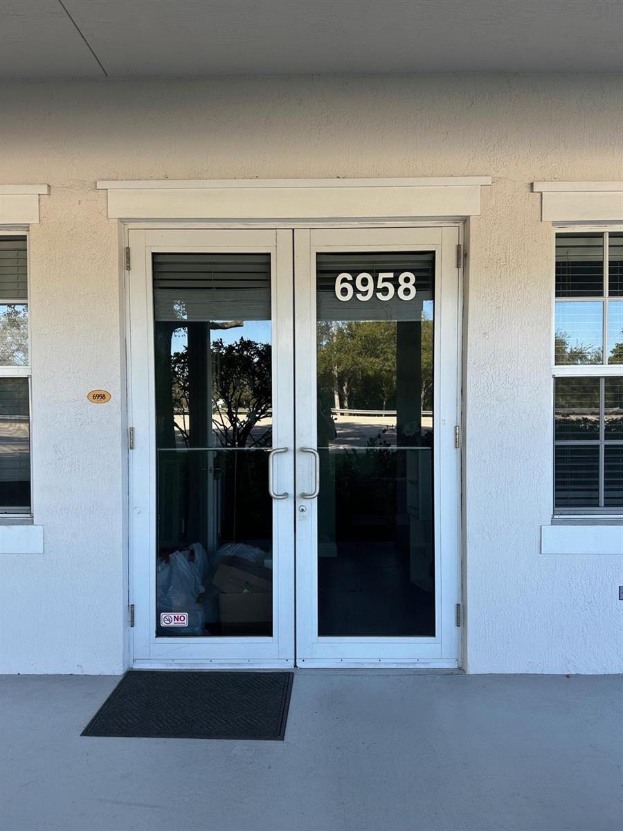 A double glass door entrance with the number 6958 displayed on the window — 6958 Griffin Road # 9, Davie FL 33314, DAVIE, FL