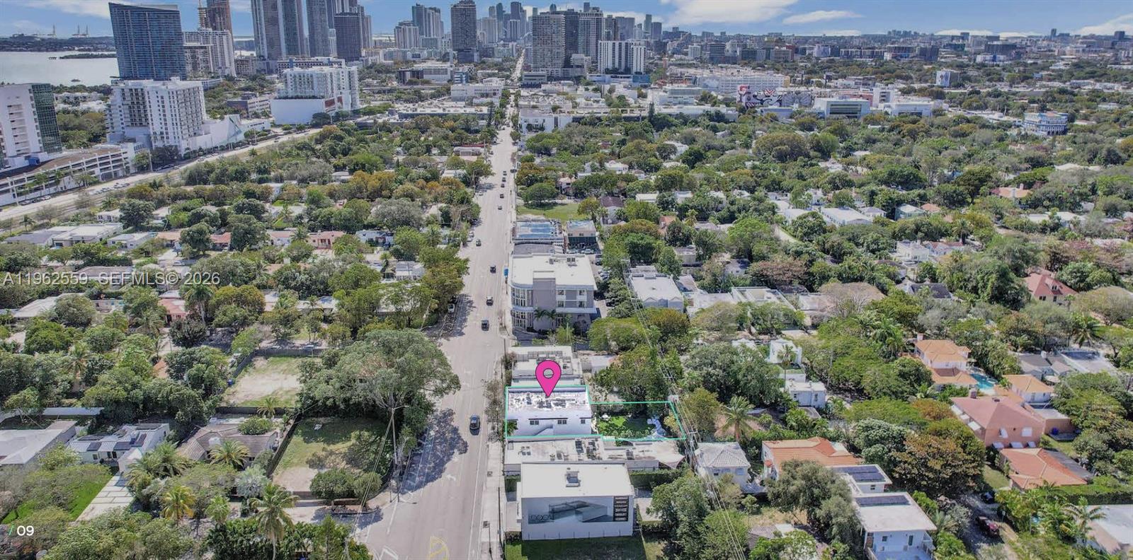 An aerial view shows a residential street with a highlighted property and city skyline background — 4730 NE 2nd Ave, Miami FL 33137, MIAMI, FL