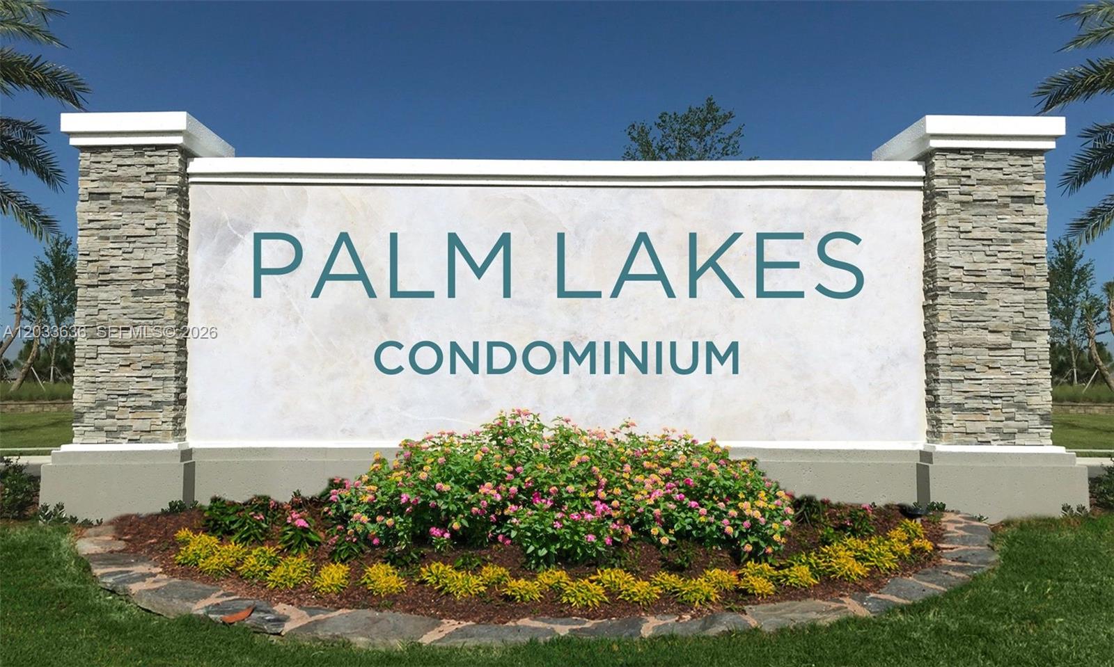 A stone-accented monument sign for Palm Lakes Condominium sits in a landscaped garden bed — 7561 NW 1st St # 204, Margate FL 33063, MARGATE, FL