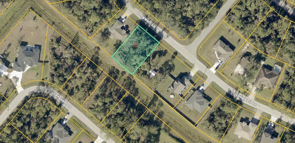 An aerial view shows a vacant, rectangular residential lot outlined in teal on a suburban street — Lot 18 LONGWELL LANE, NORTH PORT, FL
