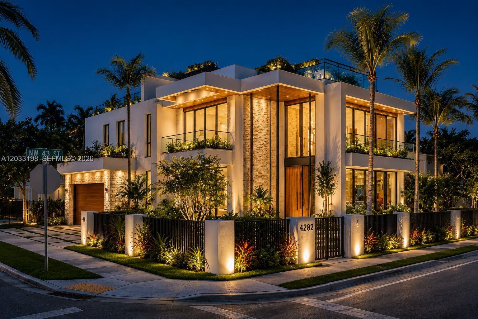 This is a rendering of a modern two-story house with stone accents and exterior lighting — 4282 NW 1st Ave, Miami FL 33127, MIAMI, FL