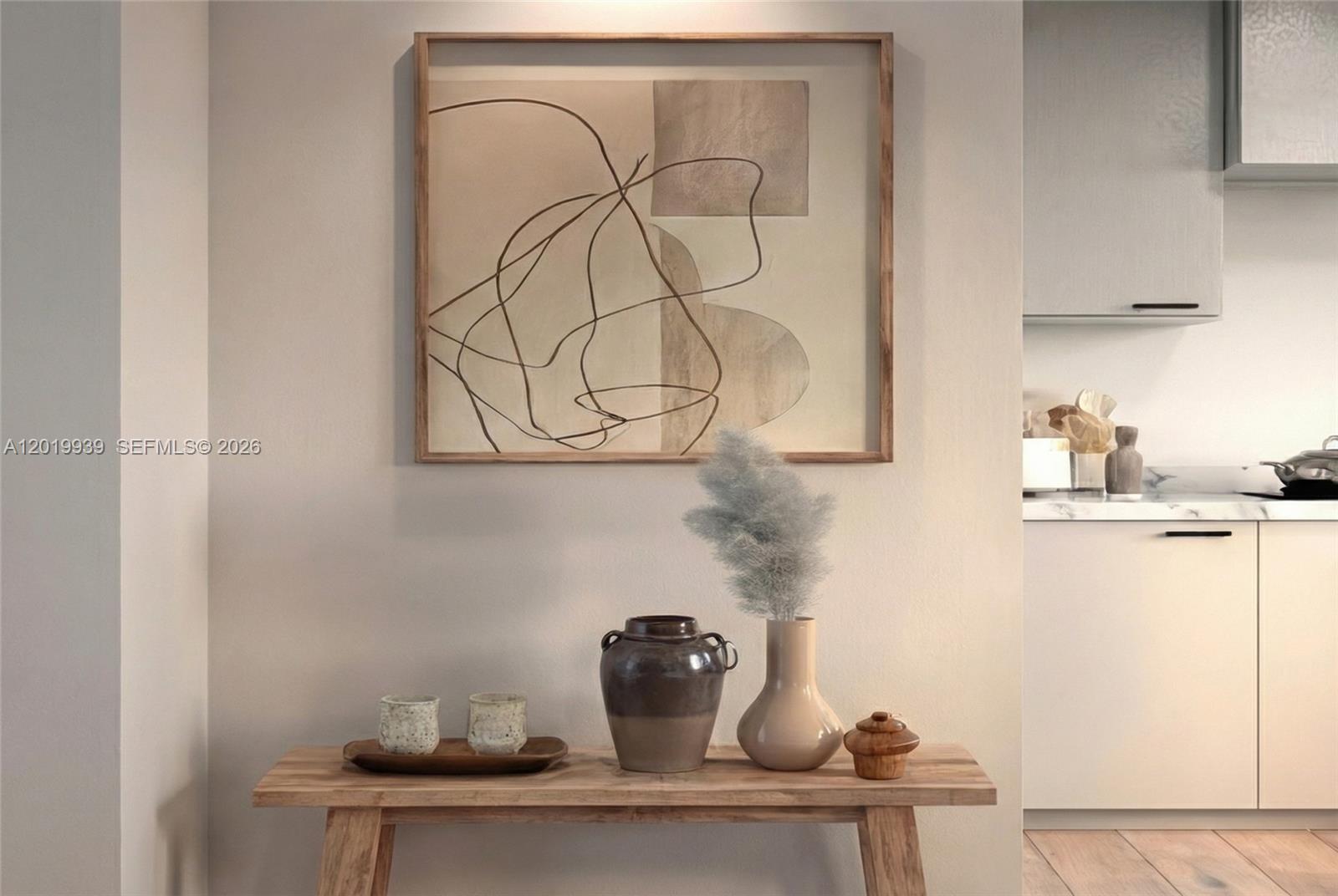 This interior rendering shows a wooden bench with decorative items beneath framed abstract wall art — FORT LAUDERDALE, FL