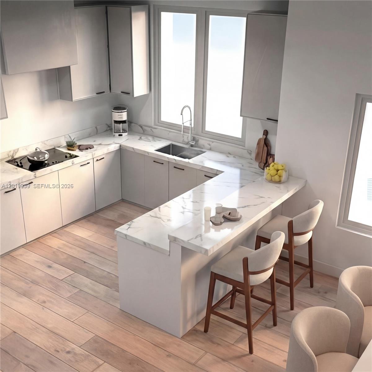 This is a rendering of a modern kitchen featuring white marble countertops and light cabinetry — FORT LAUDERDALE, FL