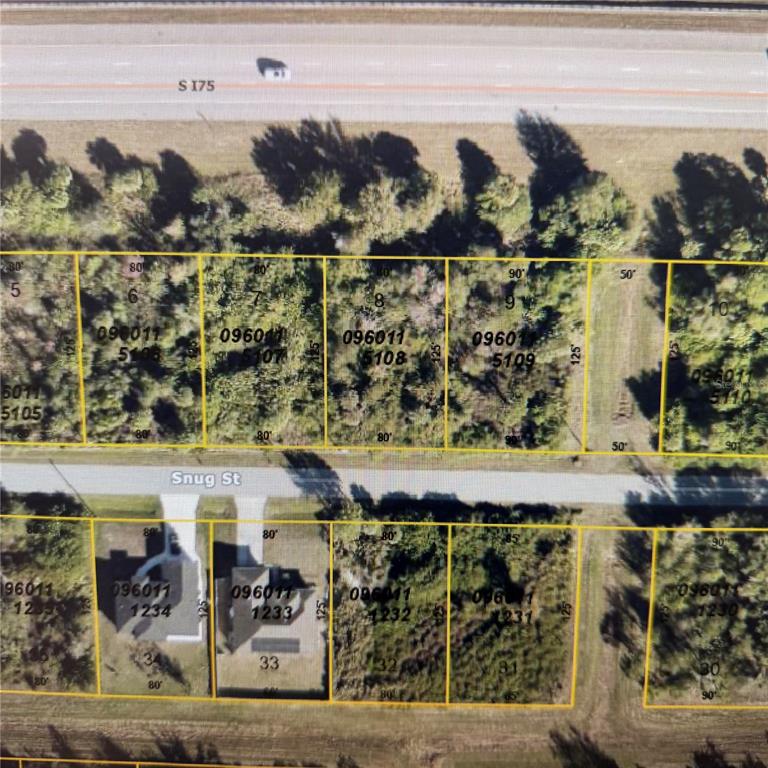 This aerial map shows residential lots along Snug Street near a highway — SNUG STREET, NORTH PORT, FL