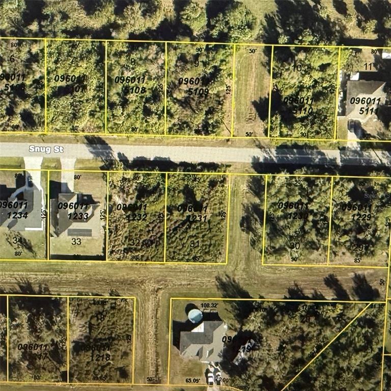 This is an aerial map showing residential lots and street layouts — SNUG STREET, NORTH PORT, FL