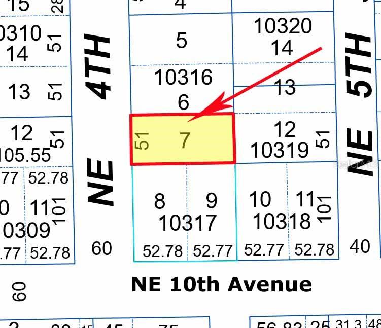 This is a map showing a highlighted rectangular land parcel labeled as lot 7 — TBD NE 4TH STREET, GAINESVILLE, FL