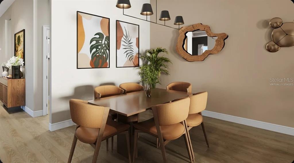 This is a virtually staged rendering of a dining room with a wooden table and chairs — 13919 IONA AVENUE, PALMETTO, FL