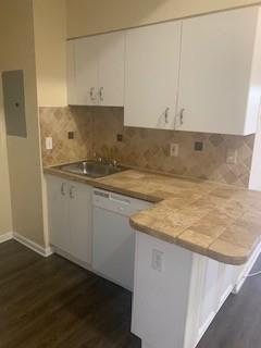 A kitchen features white cabinets, a tiled backsplash, a stainless steel sink, and tiled countertops — 3251 Sabal Palm Manor # 207, Davie FL 33024, DAVIE, FL