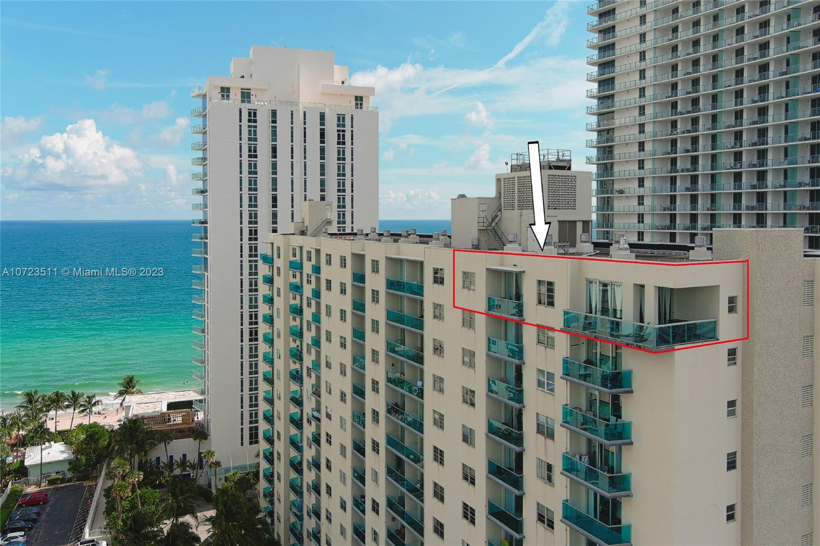 An aerial view shows the exterior of a high-rise building with a highlighted penthouse unit — 4001 S Ocean Dr, Hollywood FL 33019, HOLLYWOOD, FL