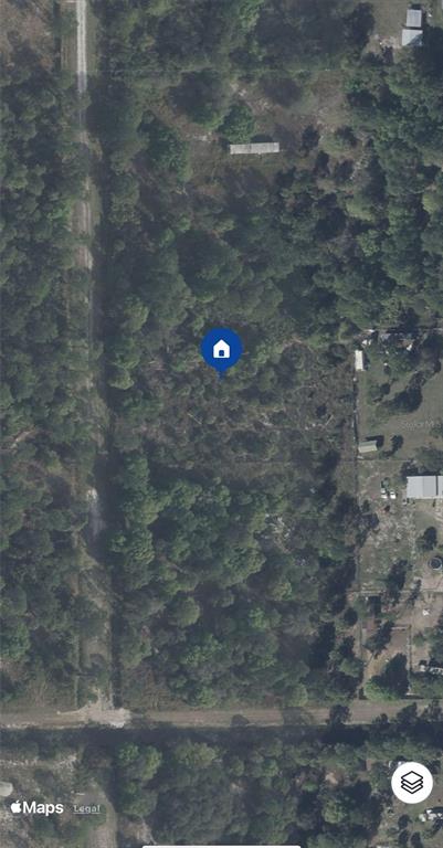 This is an aerial map view of a wooded, undeveloped plot of land — 755 S WILLOW STREET, CLEWISTON, FL
