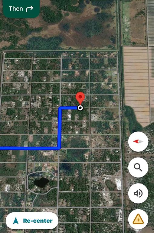 This is a satellite map view showing a blue navigation route leading to a red pin — 755 S WILLOW STREET, CLEWISTON, FL