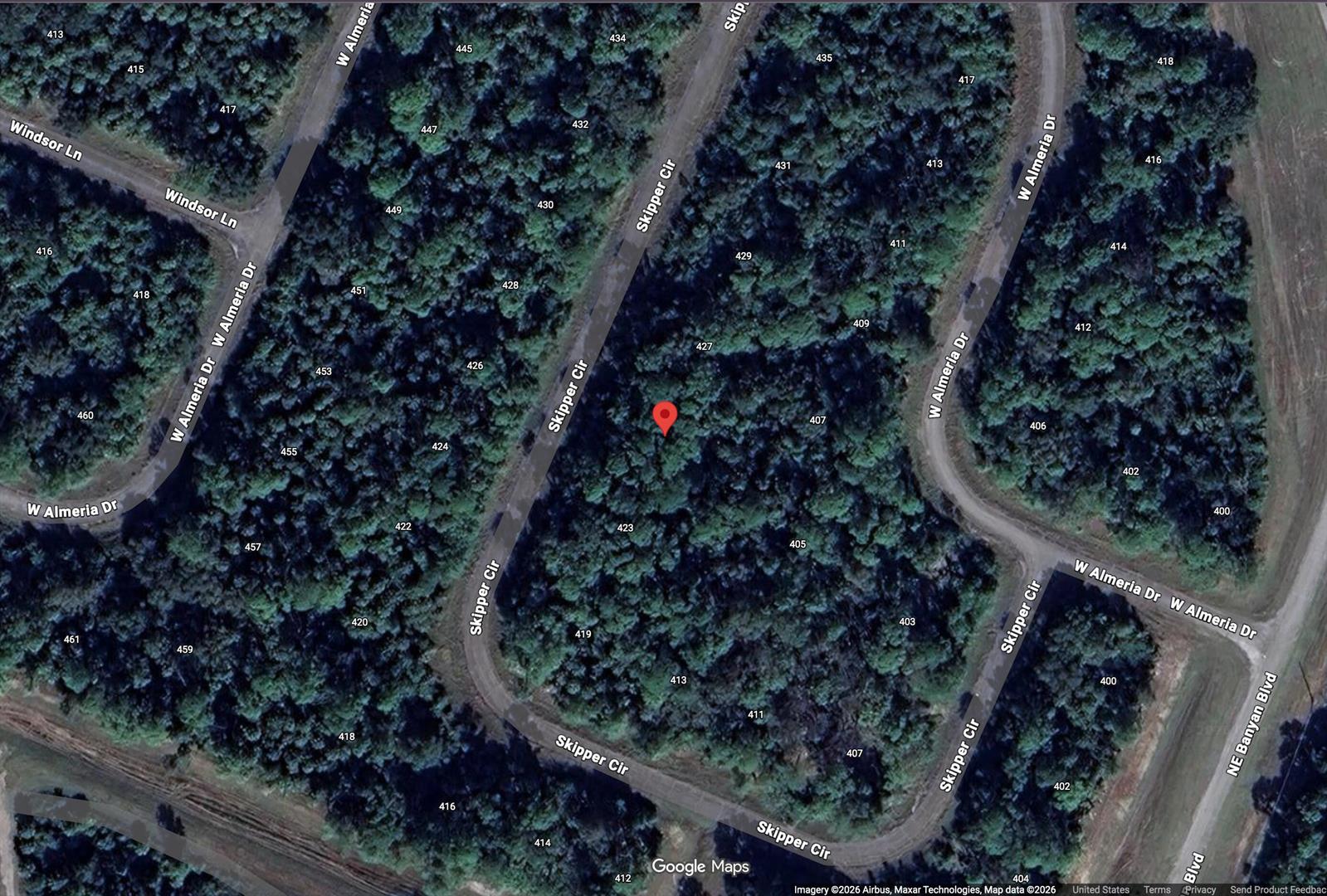 This is a satellite map view of a wooded residential area with streets and lots — 425 Skipper Terrace, FL 33935, FL