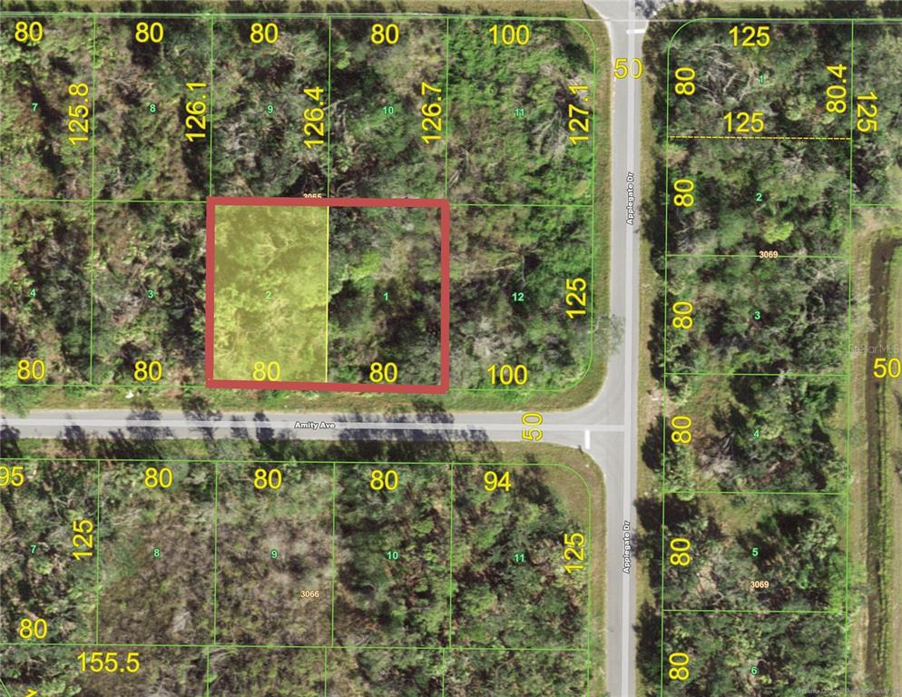 This is a map showing two adjacent rectangular land parcels highlighted in red and yellow — 15104 AMITY AVENUE, PORT CHARLOTTE, FL