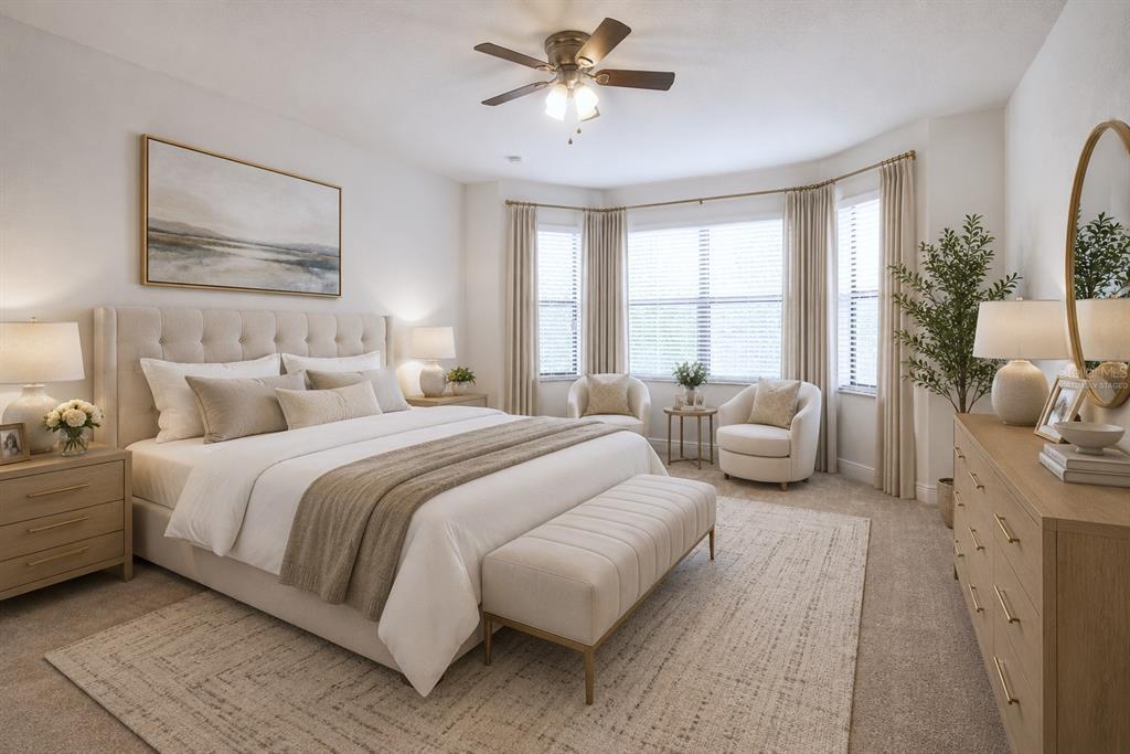 A neutral-toned bedroom features a tufted headboard, a bench, two armchairs, and a dresser — 11619 IRIS SPRING COURT, RIVERVIEW, FL