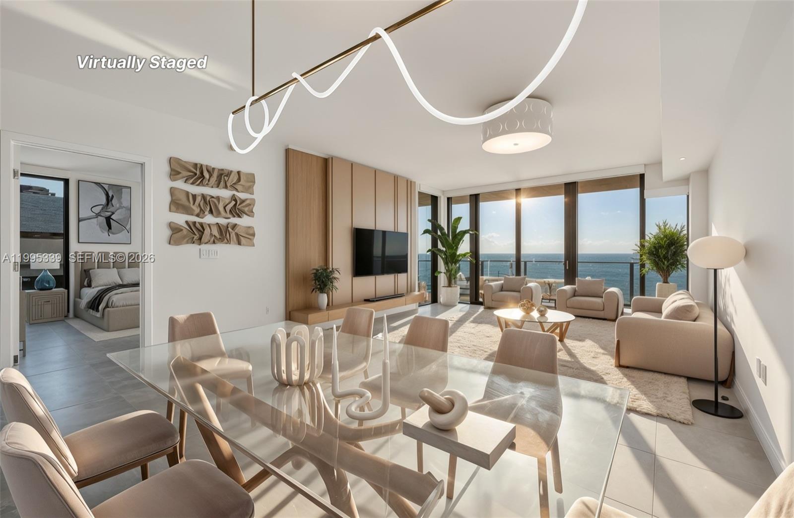 A modern living and dining area features a glass table, neutral furniture, and ocean views — 1116 N Ocean Blvd # 806, Pompano Beach FL 33062, POMPANO BEACH, FL
