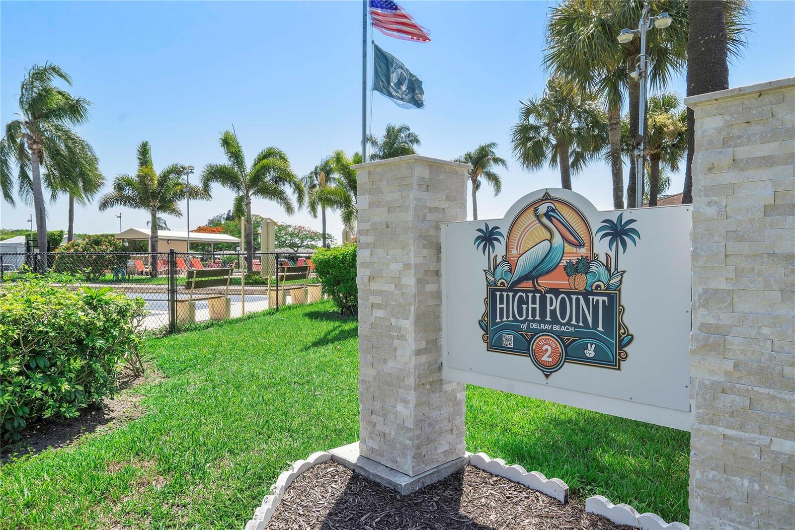 A stone monument sign for High Point of Delray Beach stands on a grassy lawn — 14620 Canalview Drive # C, Delray Beach FL 33484, DELRAY BEACH, FL