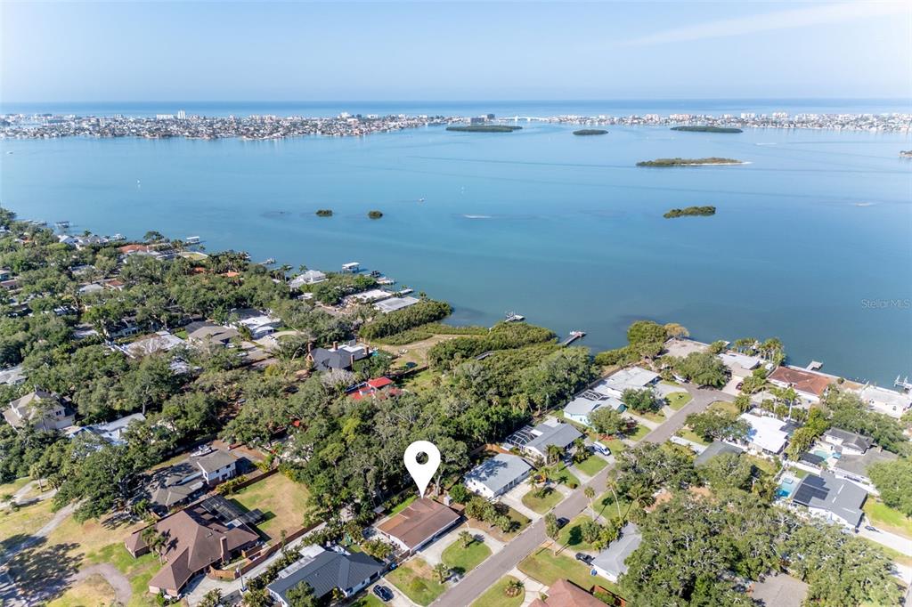 An aerial view shows a residential neighborhood with a house marked by a location pin — 8242 31ST TERRACE N, ST PETERSBURG, FL