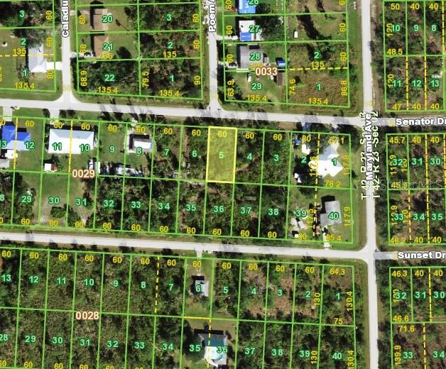 This is an aerial map showing property lot lines and parcel numbers in a residential area — 27487 SENATOR DRIVE, PUNTA GORDA, FL