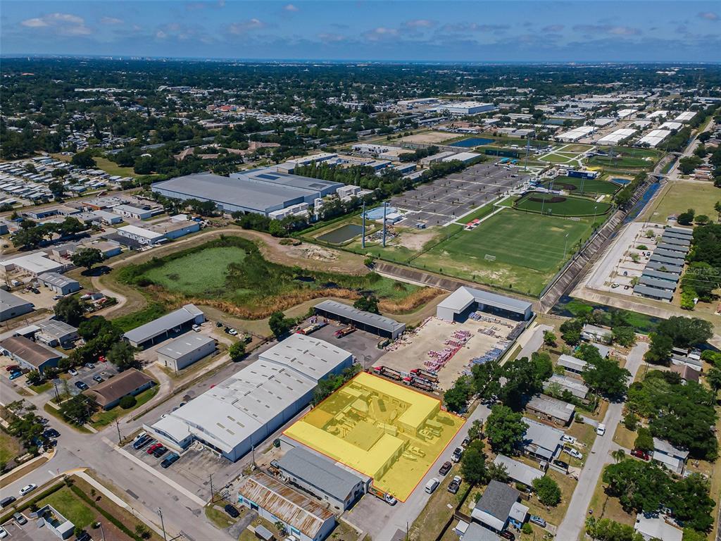 An aerial view shows a commercial warehouse property with a highlighted building section — 3580 66TH AVENUE N, PINELLAS PARK, FL
