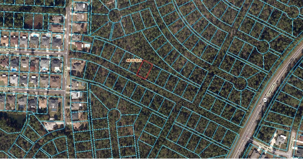 An aerial map view shows a highlighted vacant residential lot surrounded by wooded land — 08-3S-32-1200-310-003 INACCESSIBLE TRACK, PENSACOLA, FL