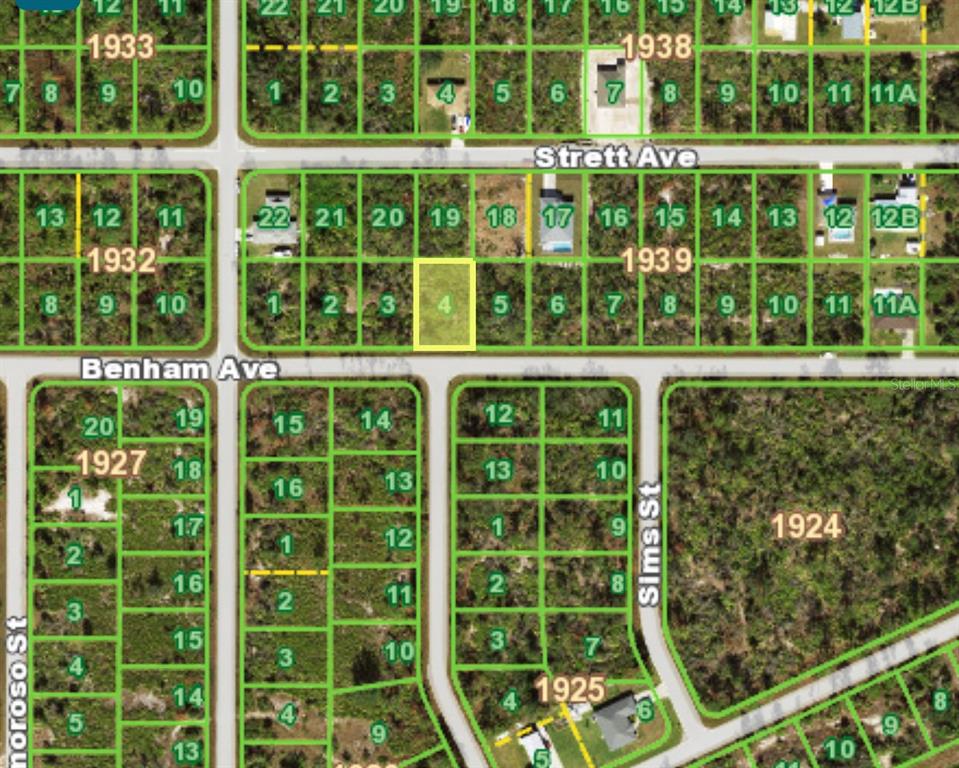 An aerial map view shows a highlighted vacant lot within a residential subdivision — 12156 BENHAM AVENUE, PORT CHARLOTTE, FL