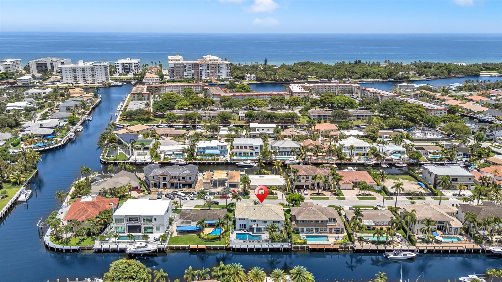 An aerial view shows a waterfront house with a pool and boat dock — 4921 NE 28TH Avenue, Lighthouse Point FL 33064, LIGHTHOUSE POINT, FL