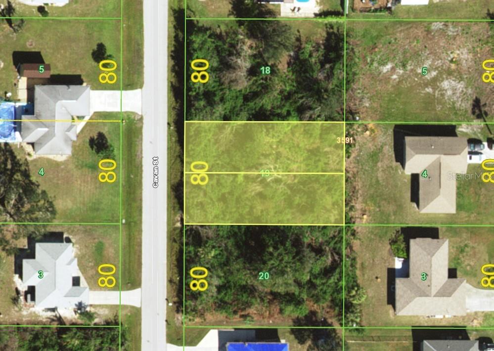 This is a satellite map view showing a vacant residential lot highlighted in yellow — 6182 CAVAN STREET, ENGLEWOOD, FL