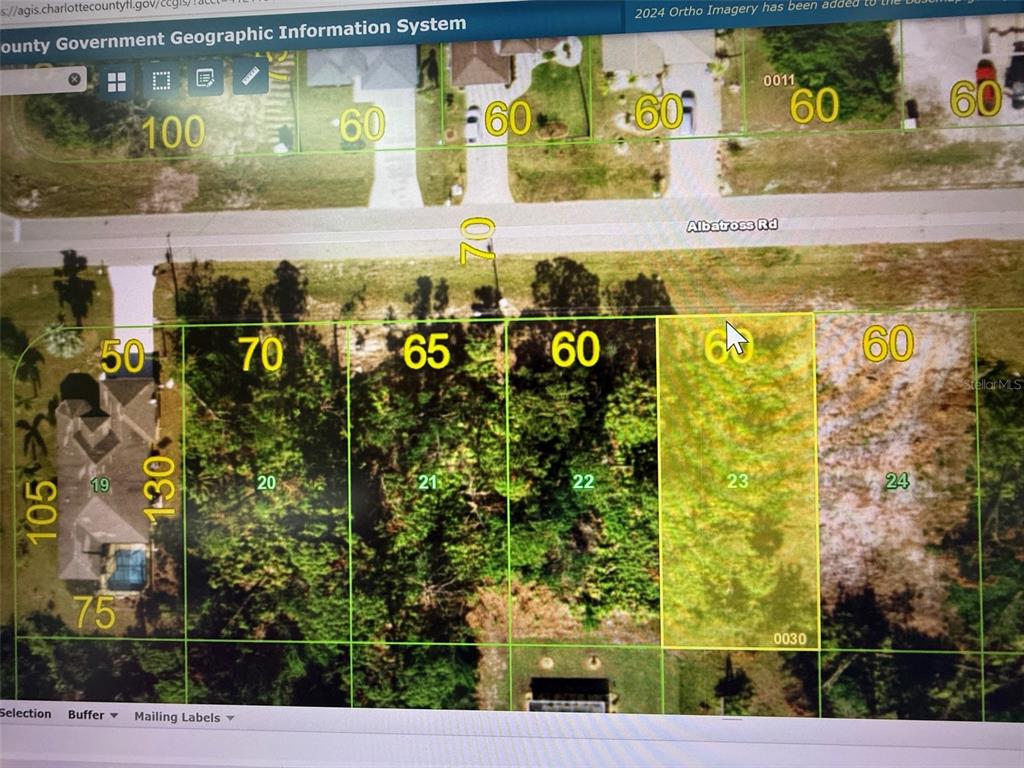 This is a digital map showing property lot lines and dimensions for a residential area — 269 ALBATROSS ROAD, ROTONDA WEST, FL