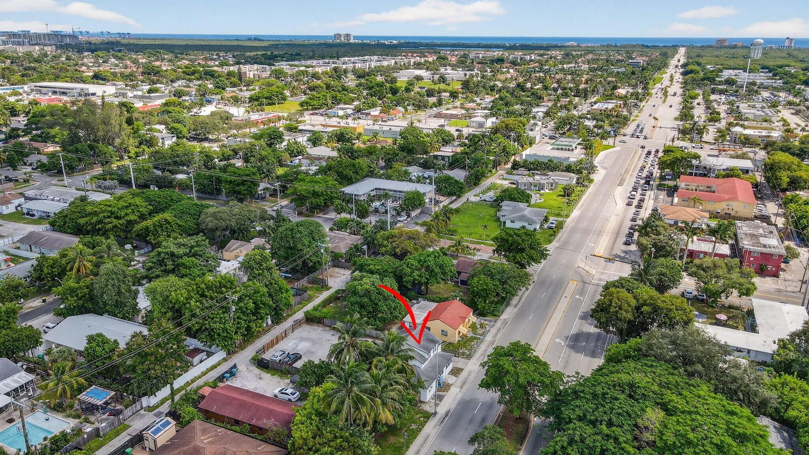 An aerial view of a residential property with a red arrow pointing to the house — 220 SW 16th Street, Dania Beach FL 33004, DANIA BEACH, FL