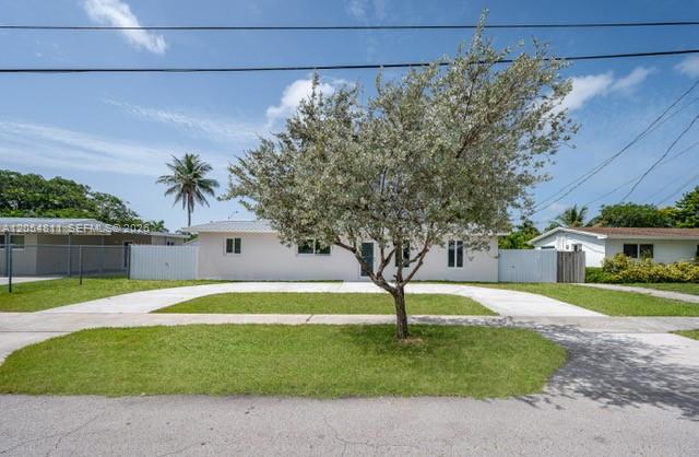 A single-story house with a white exterior and a large tree in the front yard — 10040 SW 215th St, Cutler Bay FL 33189, CUTLER BAY, FL