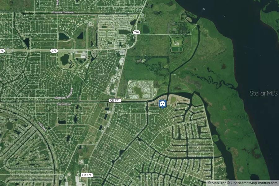 This is a satellite map showing a residential neighborhood and surrounding landscape — 8078 THRUSO ROAD, PORT CHARLOTTE, FL