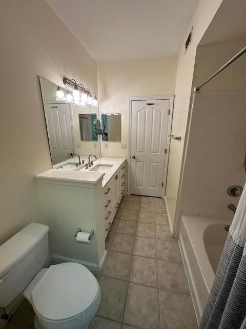 A bathroom features a white vanity with a mirror, a toilet, and a shower-tub combination — 2036 Alta Meadows Lane # 1403, Delray Beach FL 33444, DELRAY BEACH, FL