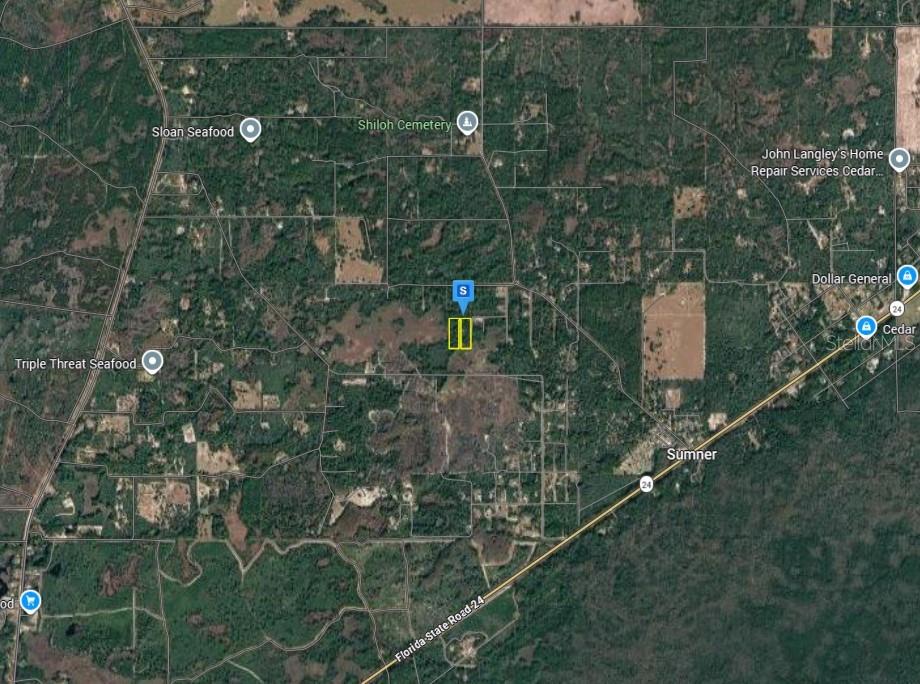 This is a satellite map view showing a highlighted property near Sumner, Florida — 7101 SW 125TH AVENUE, CEDAR KEY, FL
