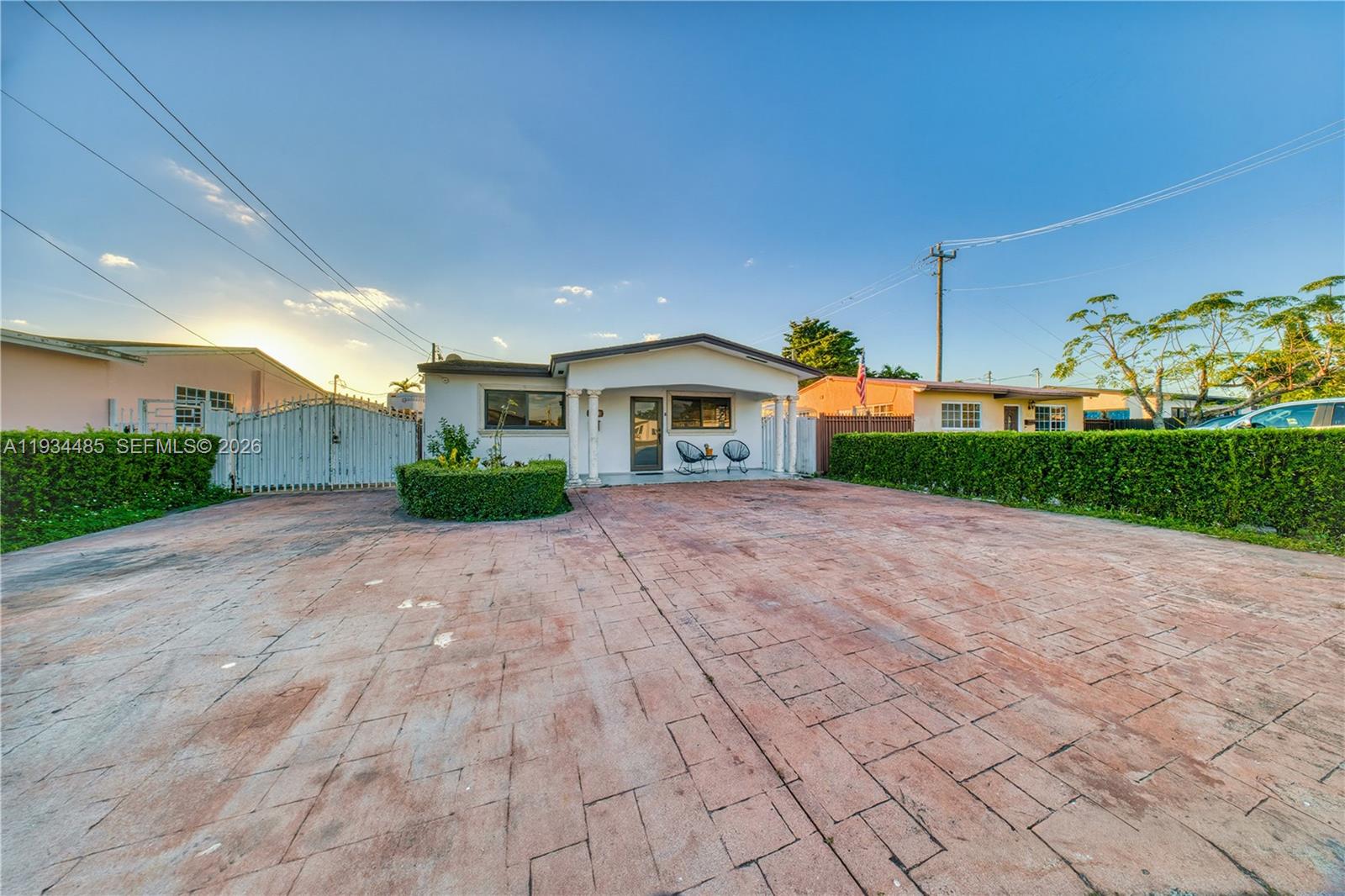 A single-story house with a paved driveway and a covered front porch — 3640 SW 92nd Ave, Miami FL 33165, MIAMI, FL