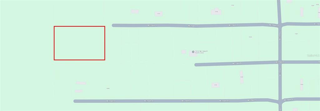 This is a map showing a rectangular property highlighted in red — 0 NE 156 PLACE, FORT MC COY, FL