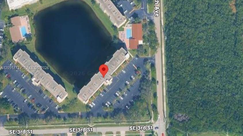 This is an aerial map view of a residential apartment complex surrounding a central lake — 441 SE 3rd St # 505, Dania Beach FL 33004, DANIA BEACH, FL