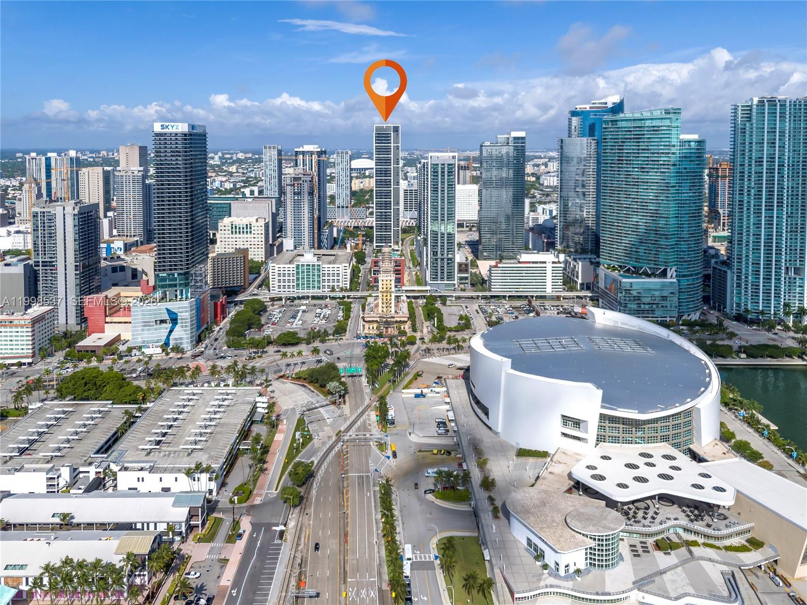 This aerial view shows a high-rise building marked with a pin in downtown Miami — 159 NE 6th St # 2403, Miami FL 33132, MIAMI, FL