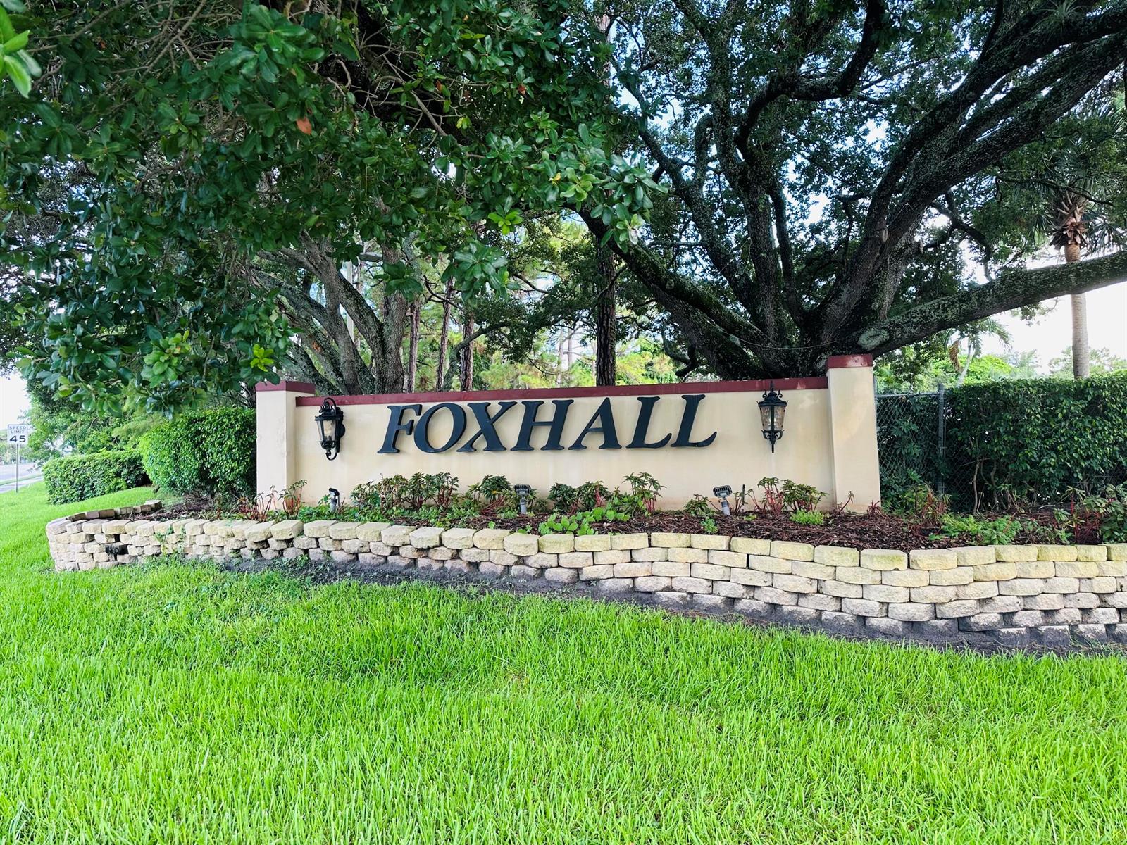A single-story house with yellow stucco walls, white corner accents, and a front-facing garage — 5165 Foxhall Pl, West Palm Beach FL 33417, WEST PALM BEACH, FL