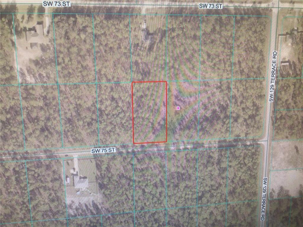 An aerial map shows a rectangular property lot outlined in red near a street intersection — 0 SW 75 STREET, DUNNELLON, FL