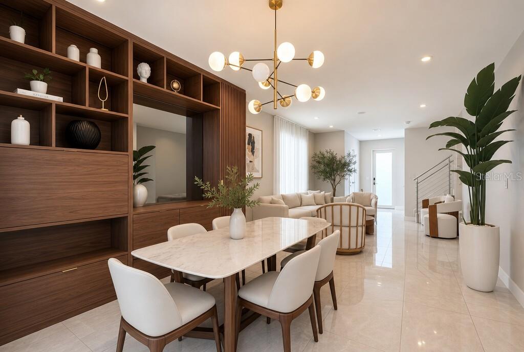 A modern dining area features a marble table, wood shelving, and a contemporary chandelier — 10384 NW 67TH TER, DORAL, FL
