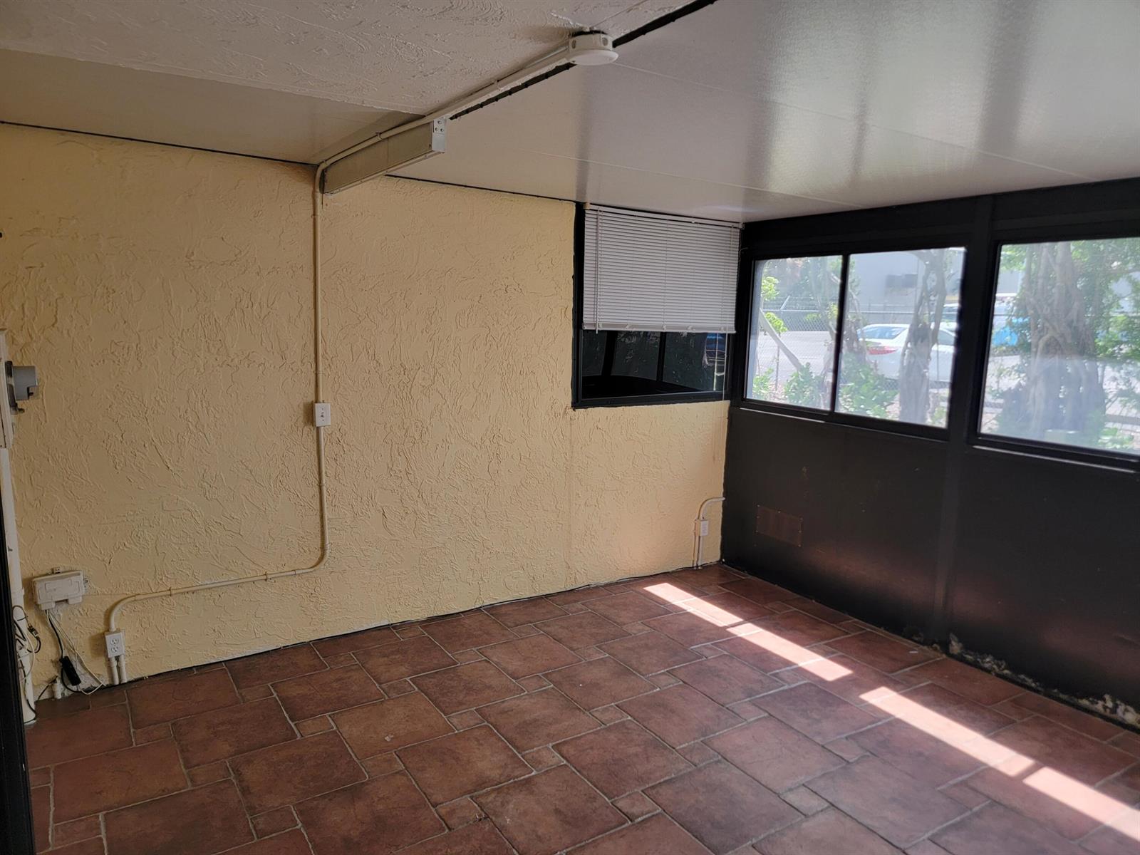 An outdoor swimming pool with a covered pavilion and lounge chairs under a clear sky — 791 SE 1st Way # 74, Deerfield Beach FL 33441, DEERFIELD BEACH, FL