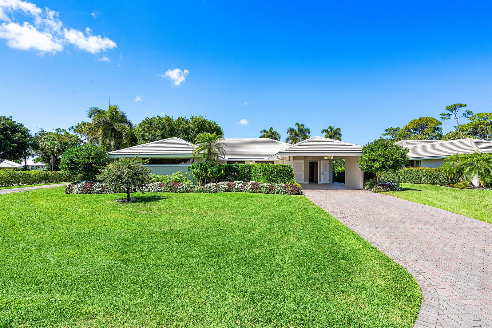 A single-story house with a tiled roof, a brick driveway, and a large front lawn — 3661 Royal Tern Circle, Boynton Beach FL 33436, BOYNTON BEACH, FL