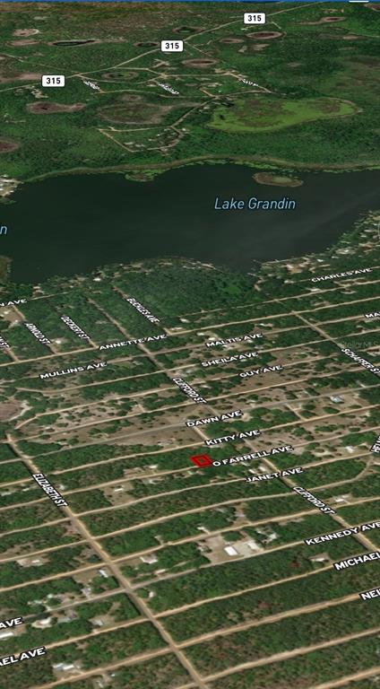 This is an aerial map view showing a highlighted property lot near Lake Grandin — LOT 32 OFFARREL DRIVE, INTERLACHEN, FL