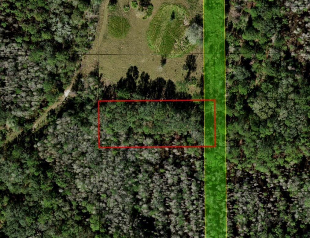 An aerial map view shows a rectangular property outlined in red next to a green easement — 0 Old Grade Road, FL 33868, FL