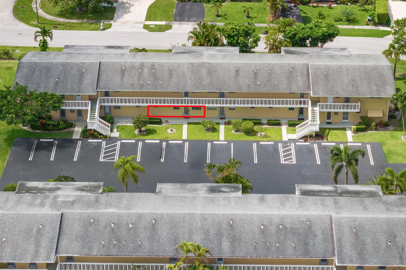 An aerial view shows a two-story apartment building with a highlighted ground-floor unit — 2102 NE 1st Way # 103, Boynton Beach FL 33435, BOYNTON BEACH, FL