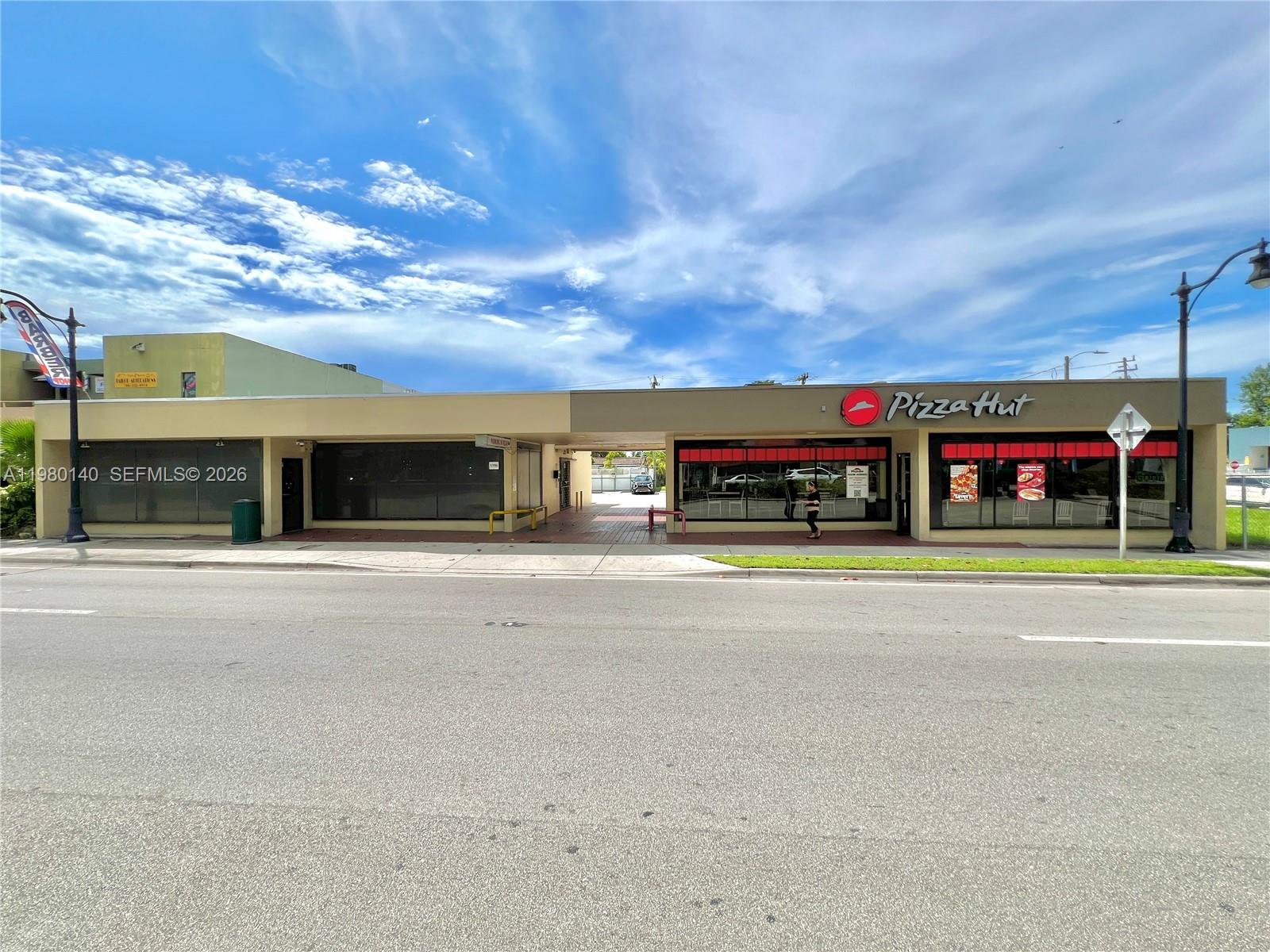 A commercial building features a Pizza Hut restaurant and an adjacent vacant storefront — 3390 SW Coral Way, Miami FL 33142, MIAMI, FL