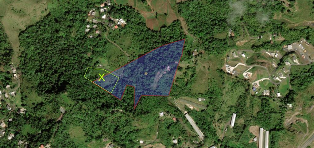This is an aerial map showing a large plot of land outlined in blue and yellow — KM 0.2 INT Bo. Helechal PR 152, BARRANQUITAS, PR