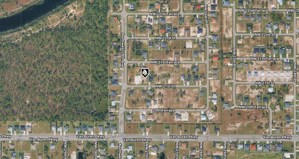 This is an aerial map view of a residential neighborhood with undeveloped lots and streets — 2721 NW 21ST STREET, CAPE CORAL, FL